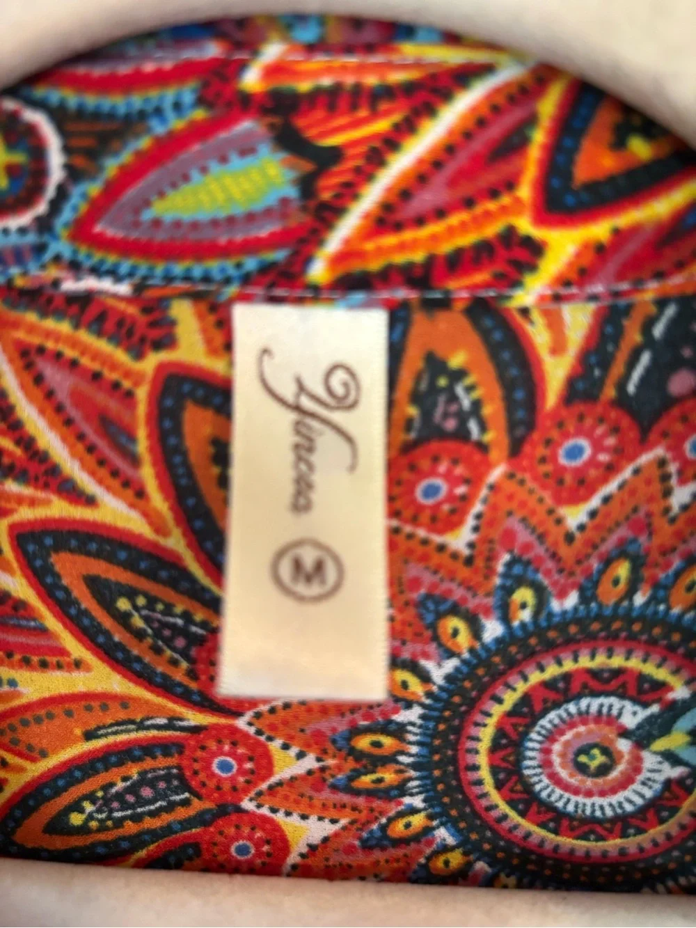 Sunburst Floral Multicolor V-Neck Tunic with Tassel Hem